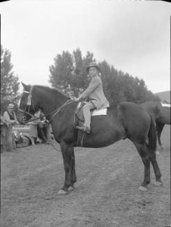 Untitled (young girl mounted on horse)