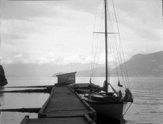 Untitled (sailboat docked at wharf)