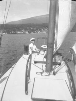 Untitled (man at tiller of sailboat)