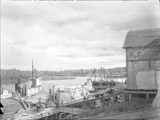 Untitled (lumber mill, dock and boats)