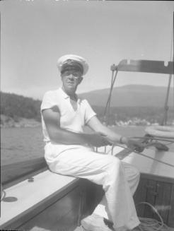 Untitled (man at tiller of sailboat)