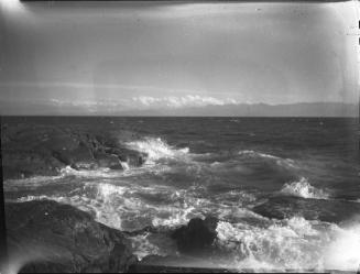 Untitled (ocean crashing against rocks)