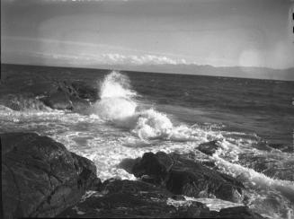 Untitled (ocean crashing against rocks)