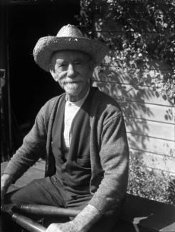 Untitled (elderly man wearing a straw hat)