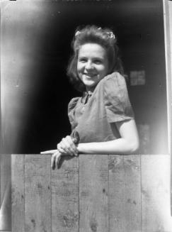Untitled (young woman in doorway)