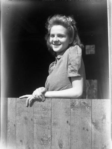 Untitled (young woman in doorway)