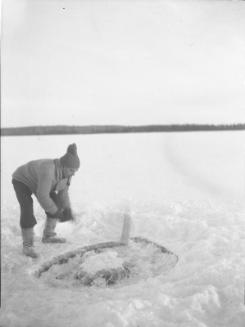 Untitled (man ice-fishing)