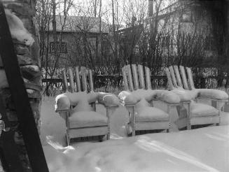 Untitled (three lawn chairs)