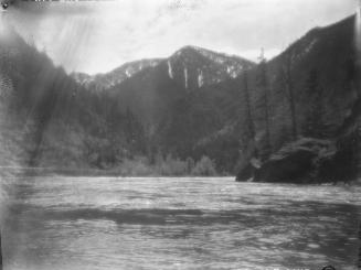 Untitled (lake through mountains)