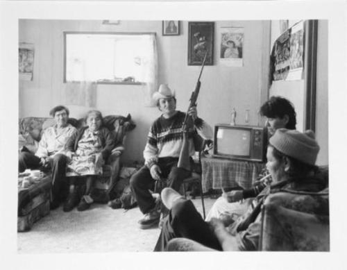Visitor with Gun, Salmon Cardinal Residence, Calling Lake, Alberta, March 1985