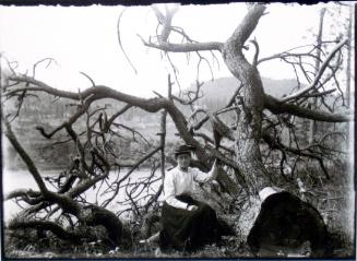 Mattie by tree, somewhere along the Columbia River between Spokane and the Lardeau (mid-1899)
