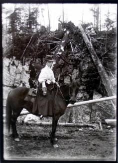 Mattie on Nellie the horse, Beaton (c.1910)