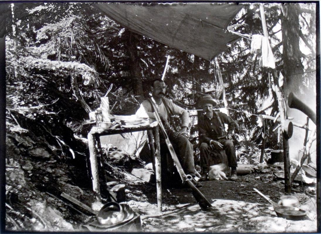 Cory Menhinick, the founder of Camborne, and his partner (possibly H.S. Wallace) on one of their claims on Pool Creek (August 26, 1900)