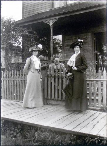 Mattie, Mrs. Catherine Freese and friend in front of Mrs. Freese's house on Alice Street in New Westminster