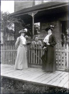 Mattie, Mrs. Catherine Freese and friend in front of Mrs. Freese's house on Alice Street in New Westminster