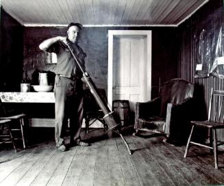 Allen Sturgess Demonstrates a 1911 National Vacuum Cleaner, Arcola Museum, 1981