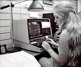 Western Development Museum, Myrna Brown Checking WDM Inventory, 1981