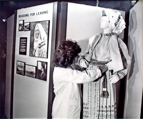 Ukranian Museum of Canada, Janet Prebushewski Adjusts Clothing Display