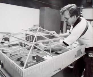 Saskatoon WDM, Rick Dixon repairs models of the Moose Jaw WDM, 1981