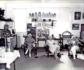 Prairie Pioneer Museum (Craik).  Museum volunteers relax at an open house put on by the museum, 1981.