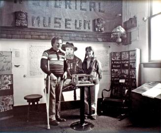 Duck Museum. Bill Martodam and Monique Doucette with case containing Gabriel Dumont's Watch, 1981