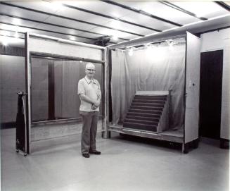 Rosetown Museum and Arts Centre. Frank Glass with one of the multi-purpose display units he's built, 1981