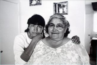 Sheila Baldhead and her mother at their home