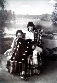 Norreen Buffalo and her mother at home showing moss bags that they made