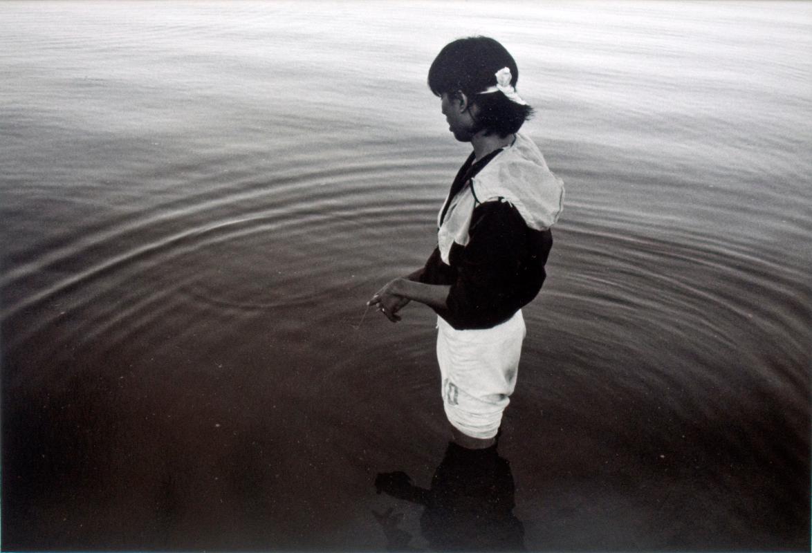 Clinton Ahenekew fishing for pickerel at the annual Culture Camp