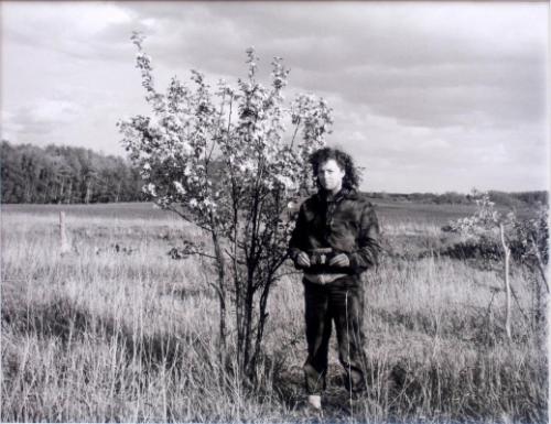 Self Portrait with a snapshot of my Mother and Myself beside a blossoming apple tree