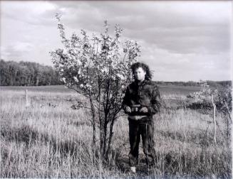 Self Portrait with a snapshot of my Mother and Myself beside a blossoming apple tree