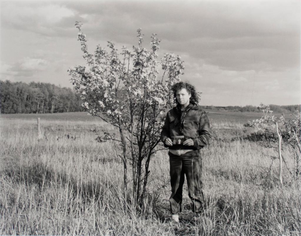 Self Portrait with a snapshot of my Mother and Myself beside a blossoming apple tree