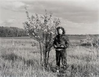 Self Portrait with a snapshot of my Mother and Myself beside a blossoming apple tree