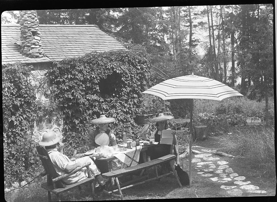 Untitled (group at picnic table)
