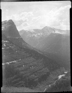 Untitled (stream and valley between mountains)