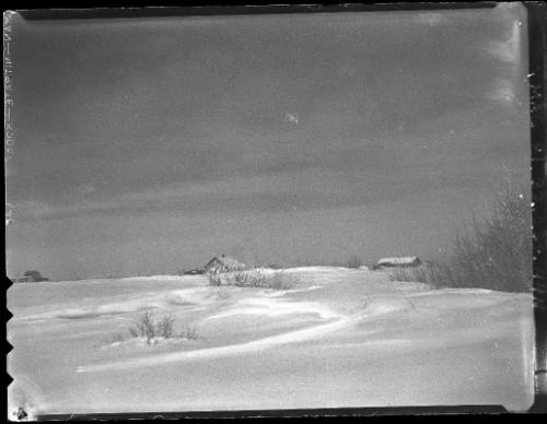 Untitled (snow-covered farm)