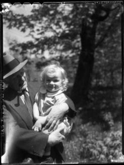Untitled (man holding baby)