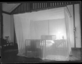 Untitled (bed with curtain)