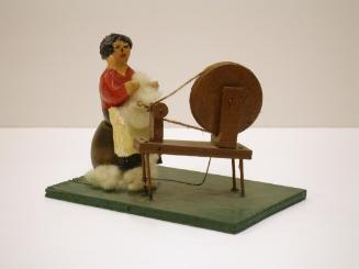 Untitled (woman carding wool)