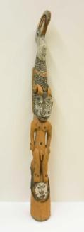 Carved roof crest ceremonial house